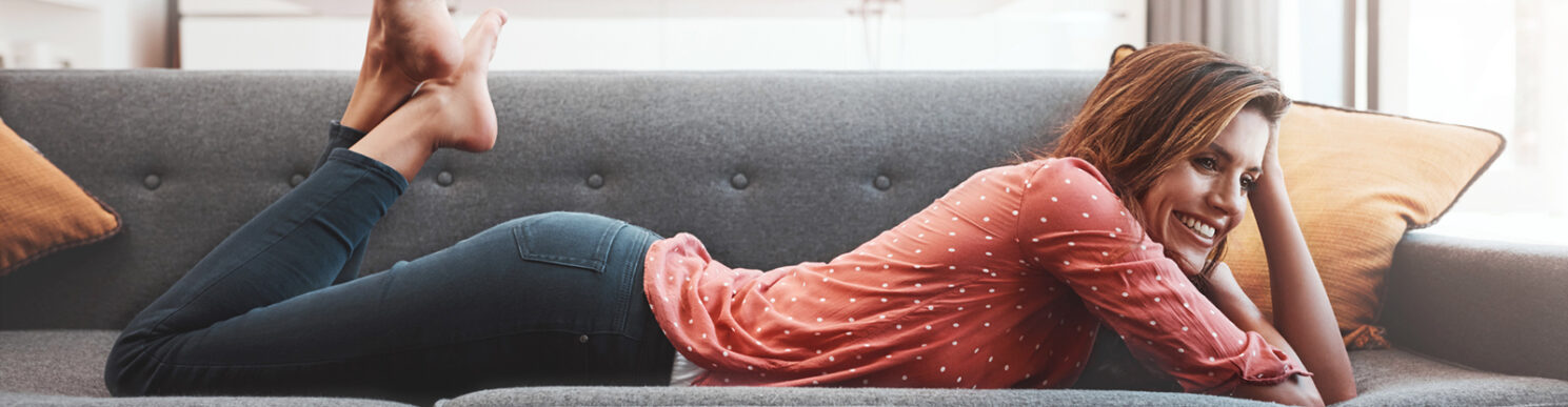 Woman relaxing on sofa